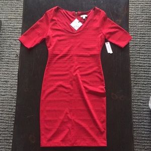Red bodycon dress with 3/4 sleeves